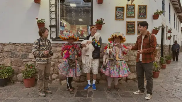 Tourists in Cusco experiencing Peruvian culture
